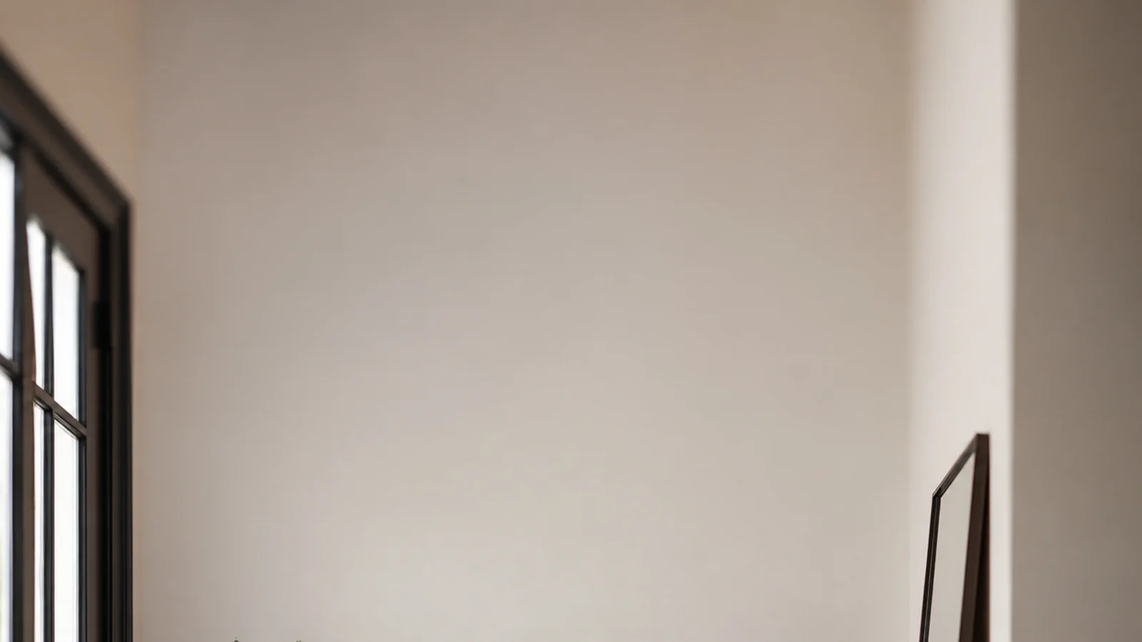 vertical image of entryway mistakes fixed with correct hook and mirror heights