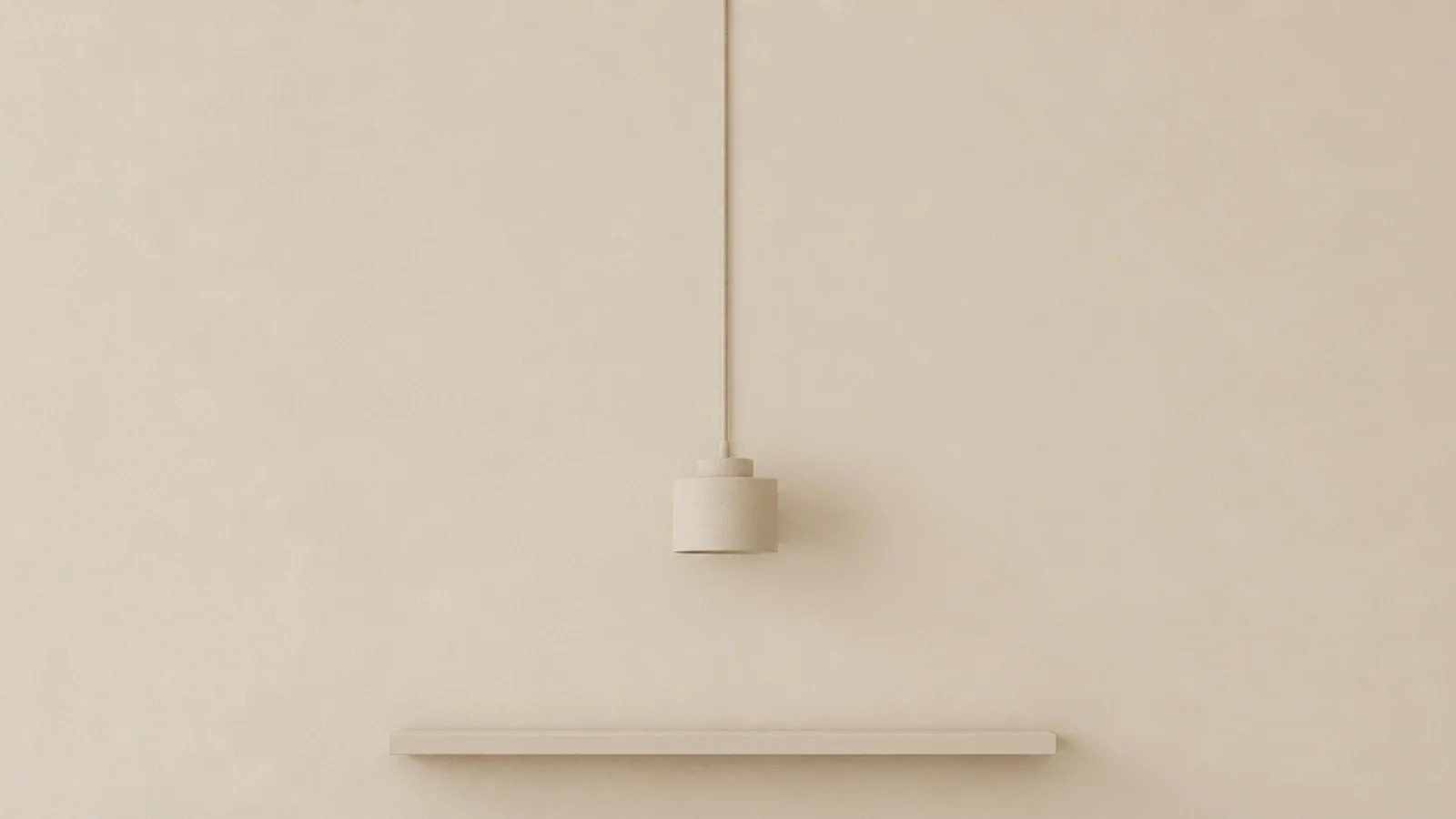 pale fabric cord blending into the wall it runs beside