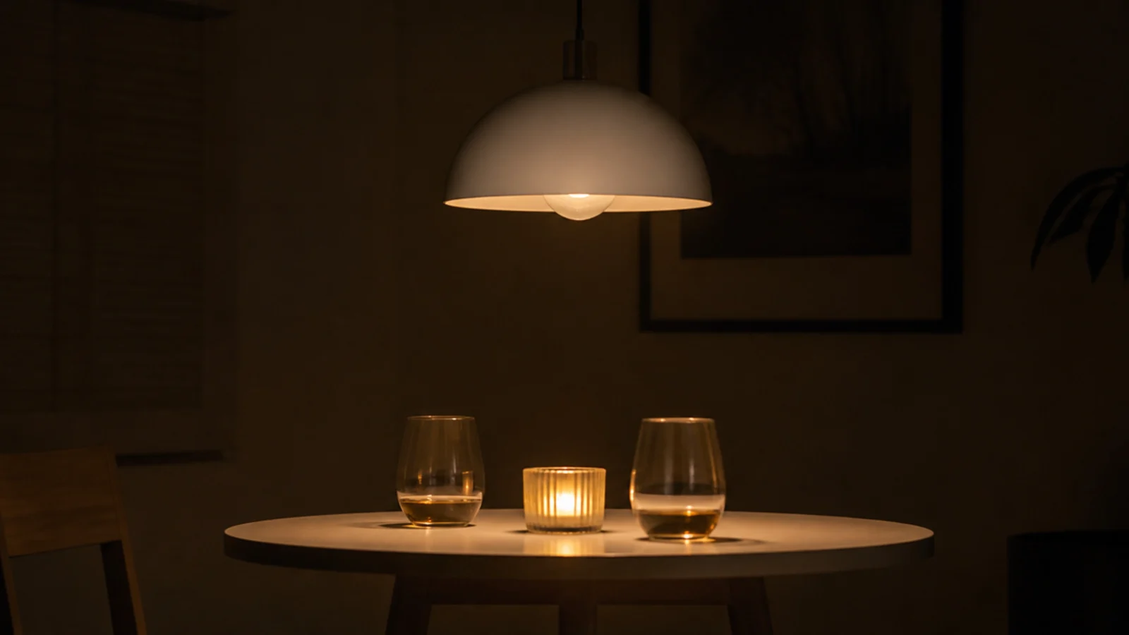 ordinary shade holding a smart bulb dimmed low in the evening