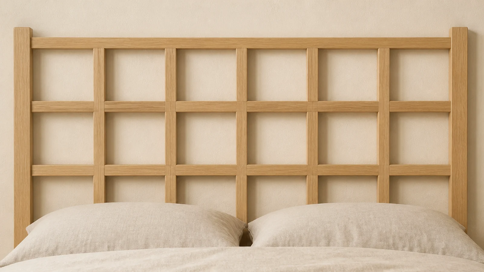half lap wooden grid headboard forming even squares against a cream wall