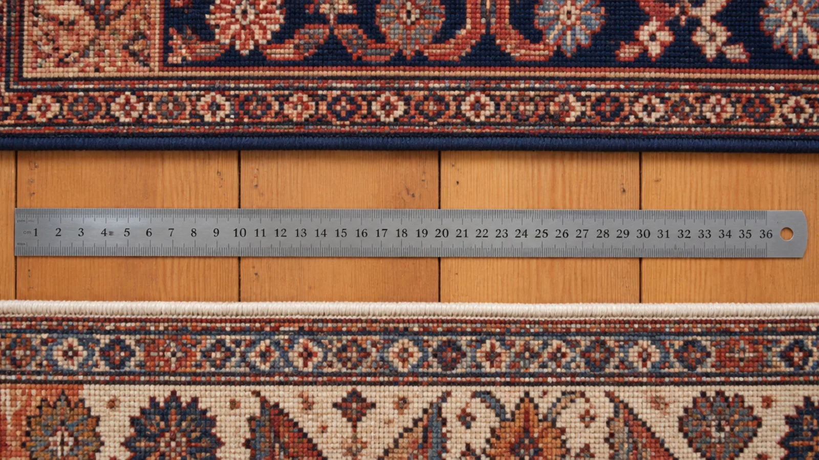 top and base rug edges running exactly parallel across a floor