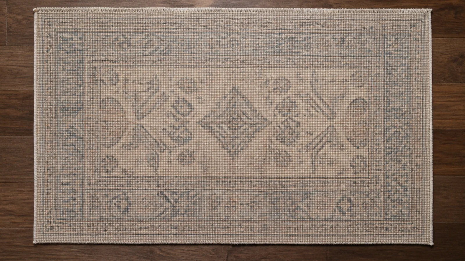 reverse of a hand knotted rug showing the knot grid in daylight