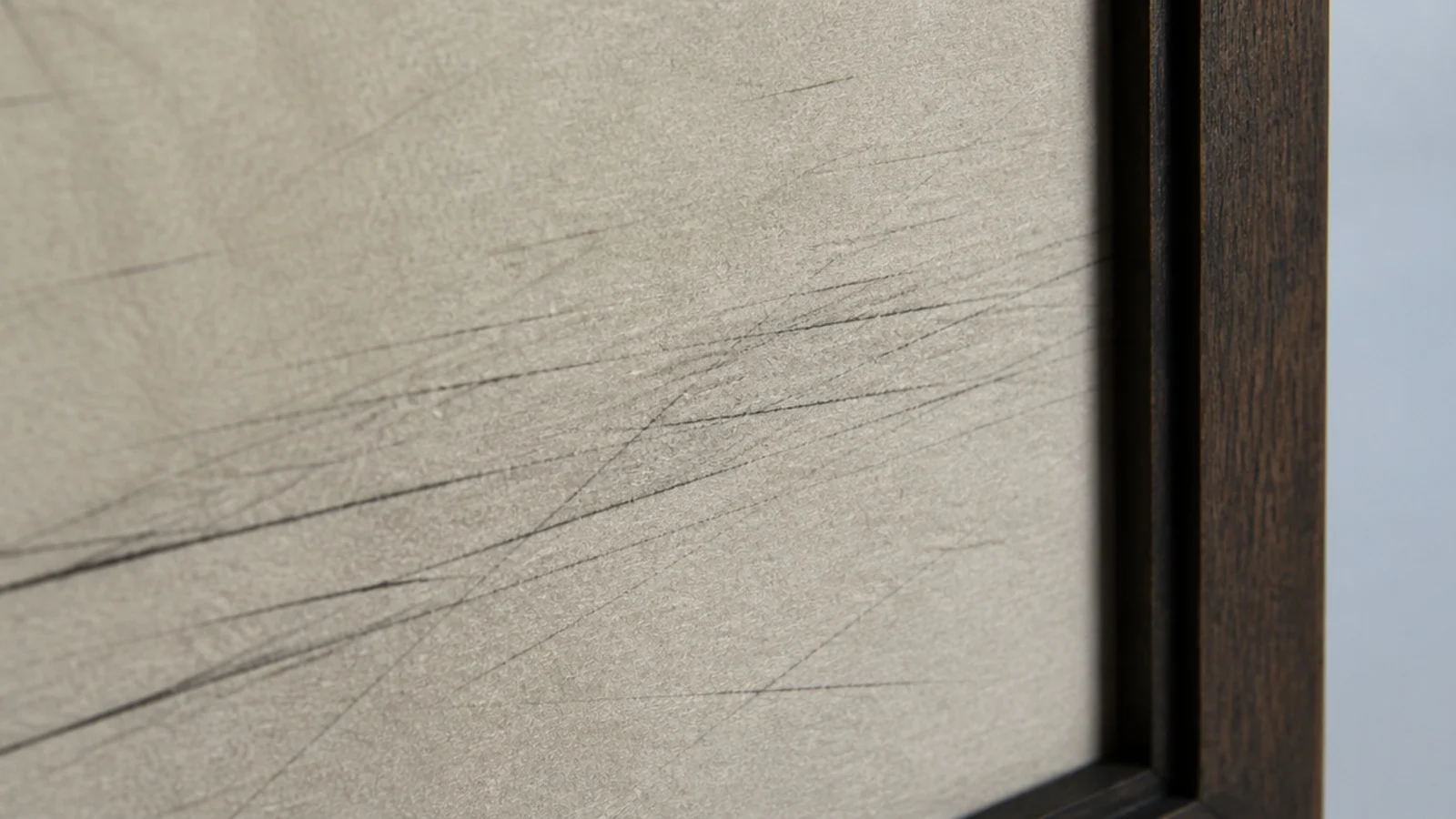 faint linear drawing threaded across a pale contemporary rug surface