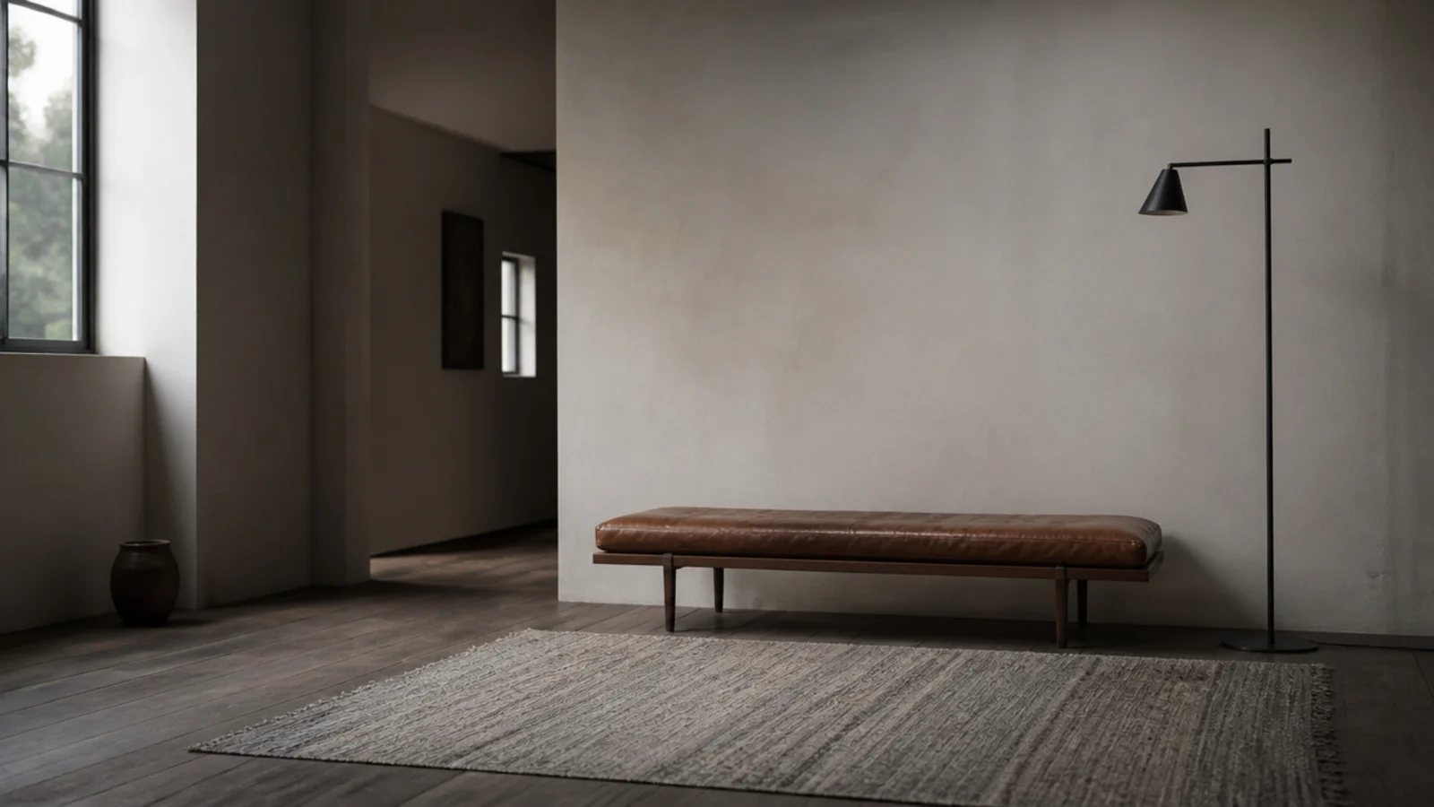 thin flatweave rug in a spare room with very little furniture