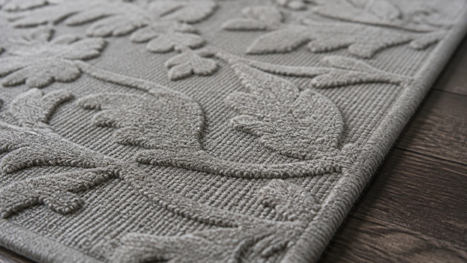 raised overtufted motif standing proud of a flat woven rug ground
