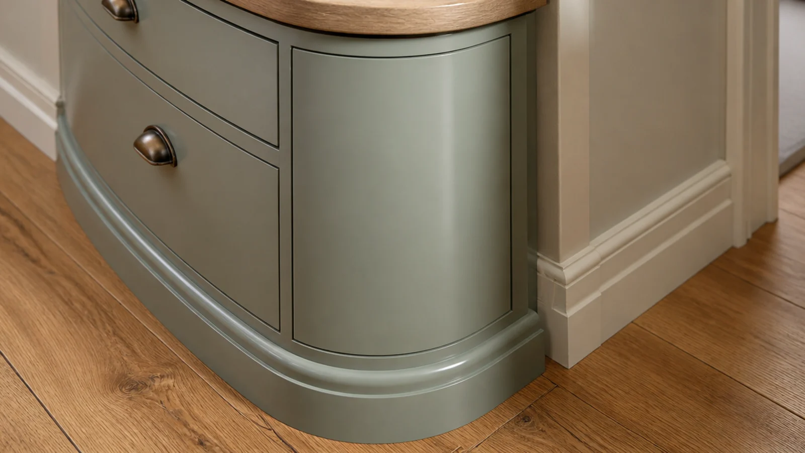 shoe cabinet with a rounded front corner at a tight hallway turn