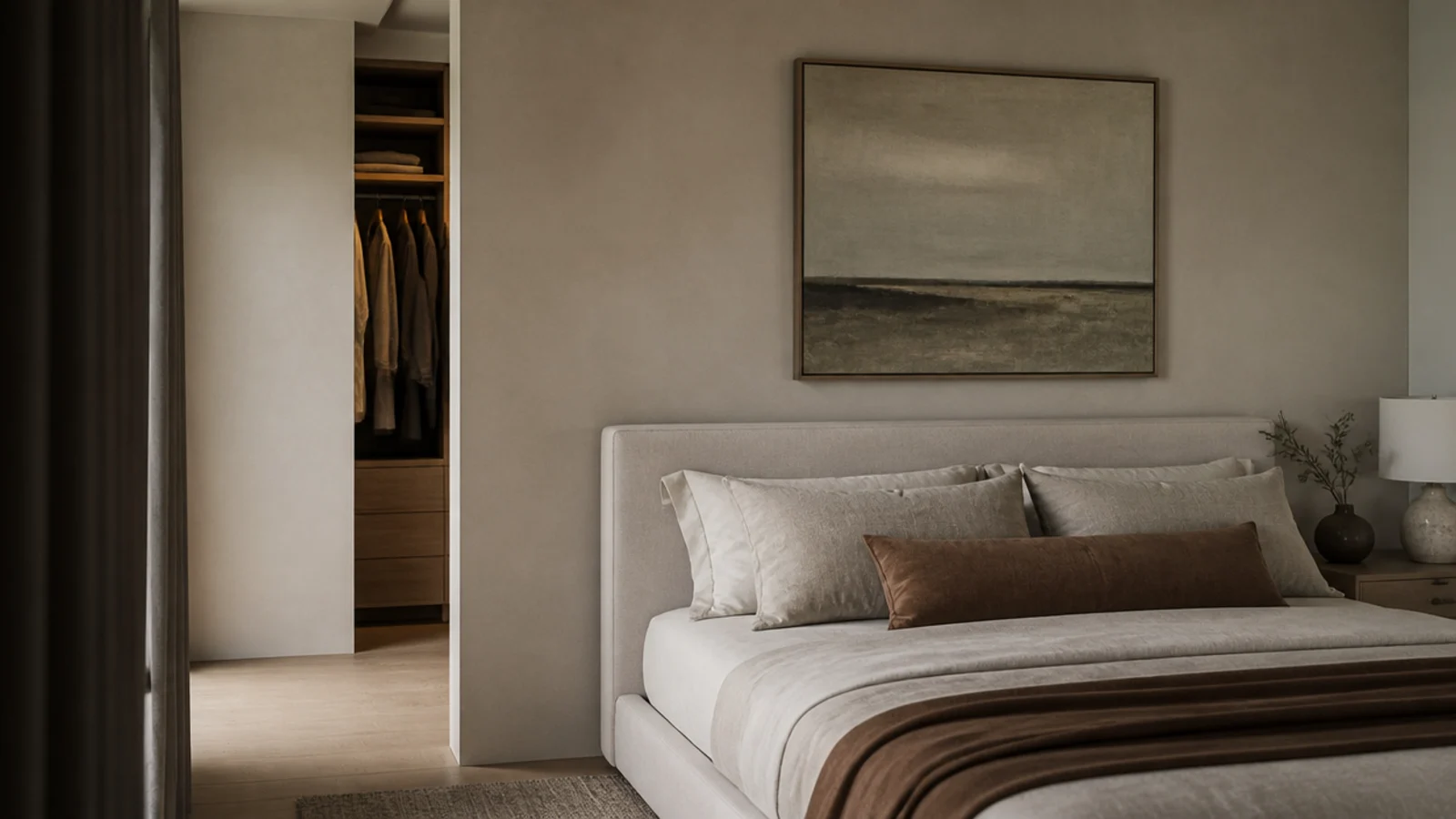 false wall behind a bed hiding a narrow walk-in closet beyond