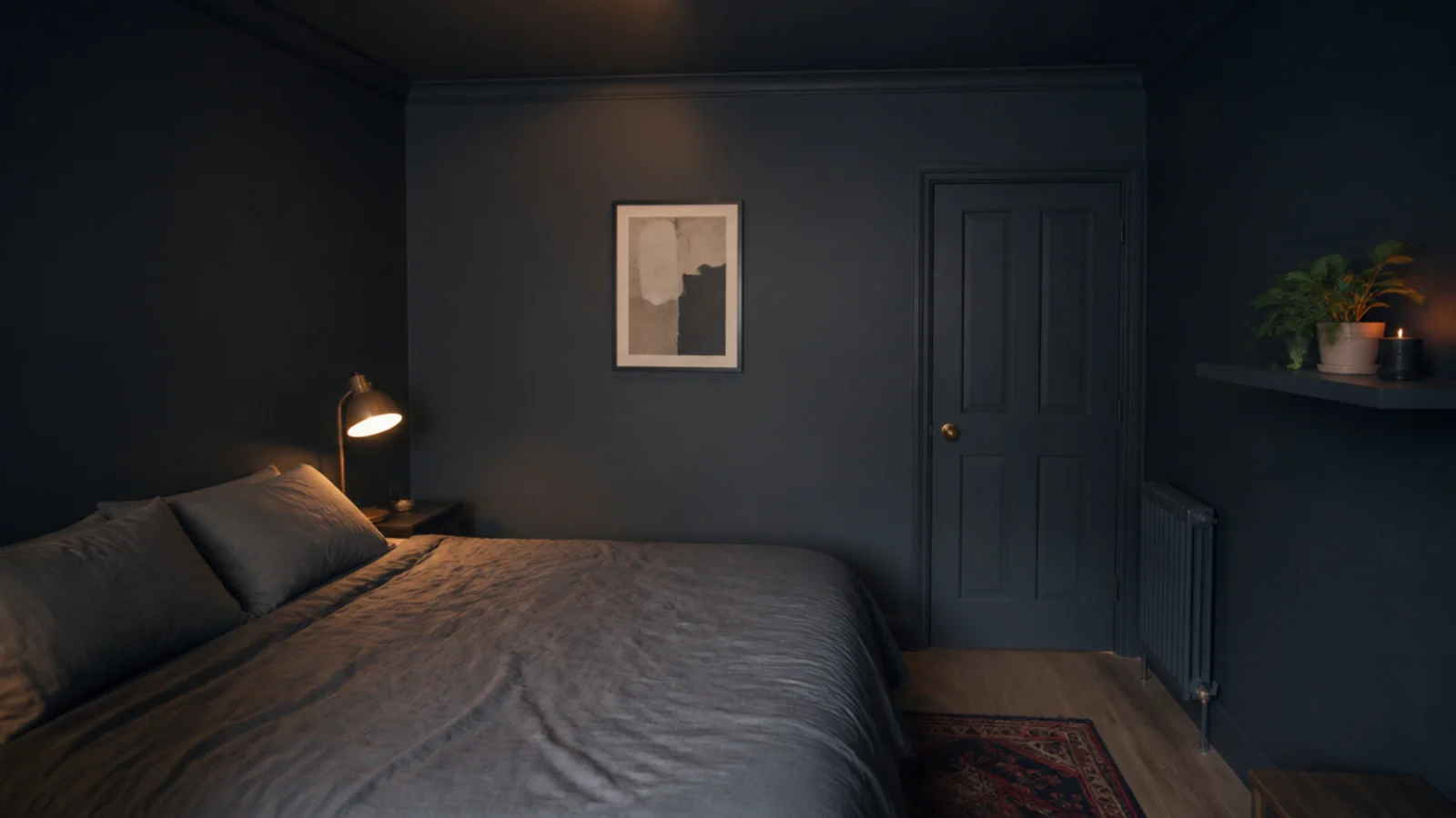 small bedroom painted one deep tone across walls trim and ceiling