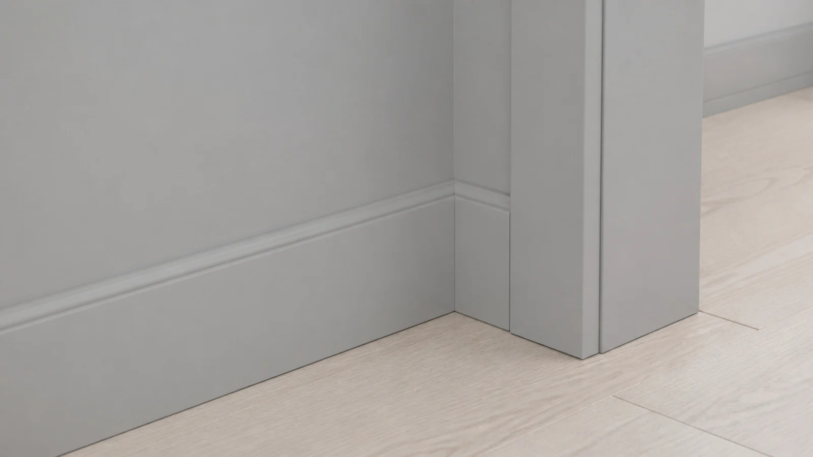 skirting and door frame painted the same tone as the bedroom wall