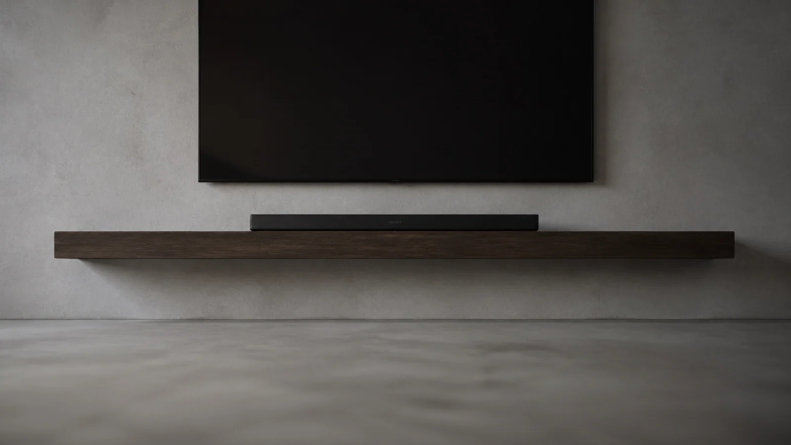 one deep floating shelf under a screen carrying only a soundbar