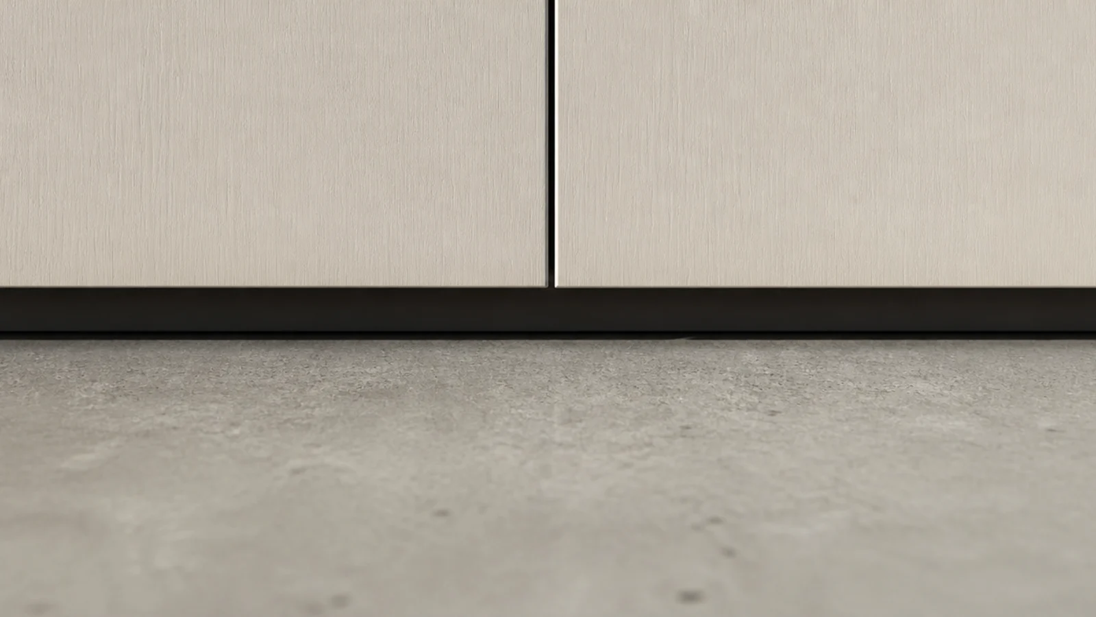 narrow dark reveal running beneath a modern cabinet along the floor