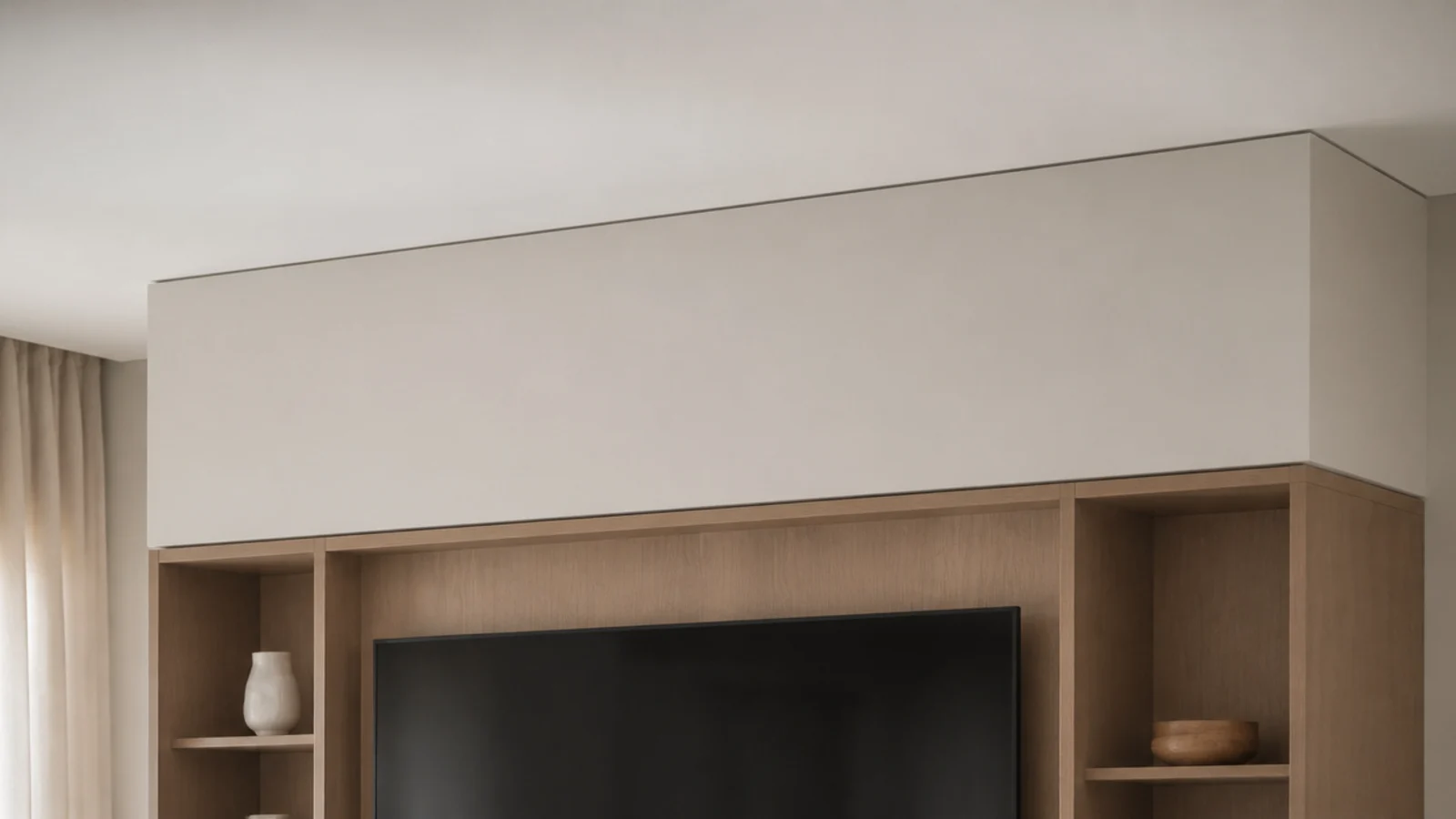 plastered bulkhead bridging the space between joinery and ceiling