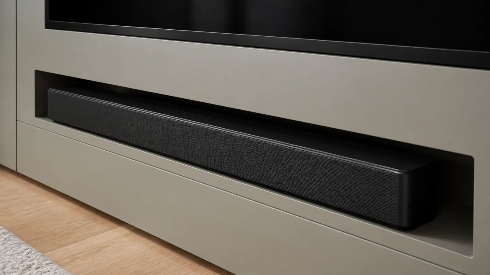 soundbar seated in a cut slot within a painted joinery front