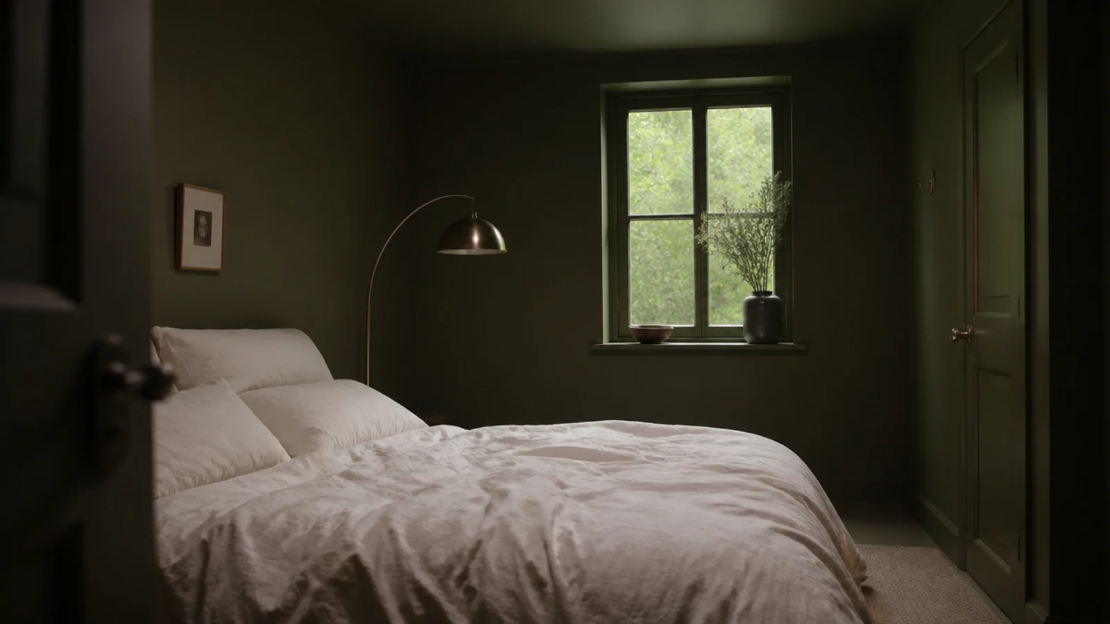 bedroom drenched in one deep muted tone across walls and ceiling
