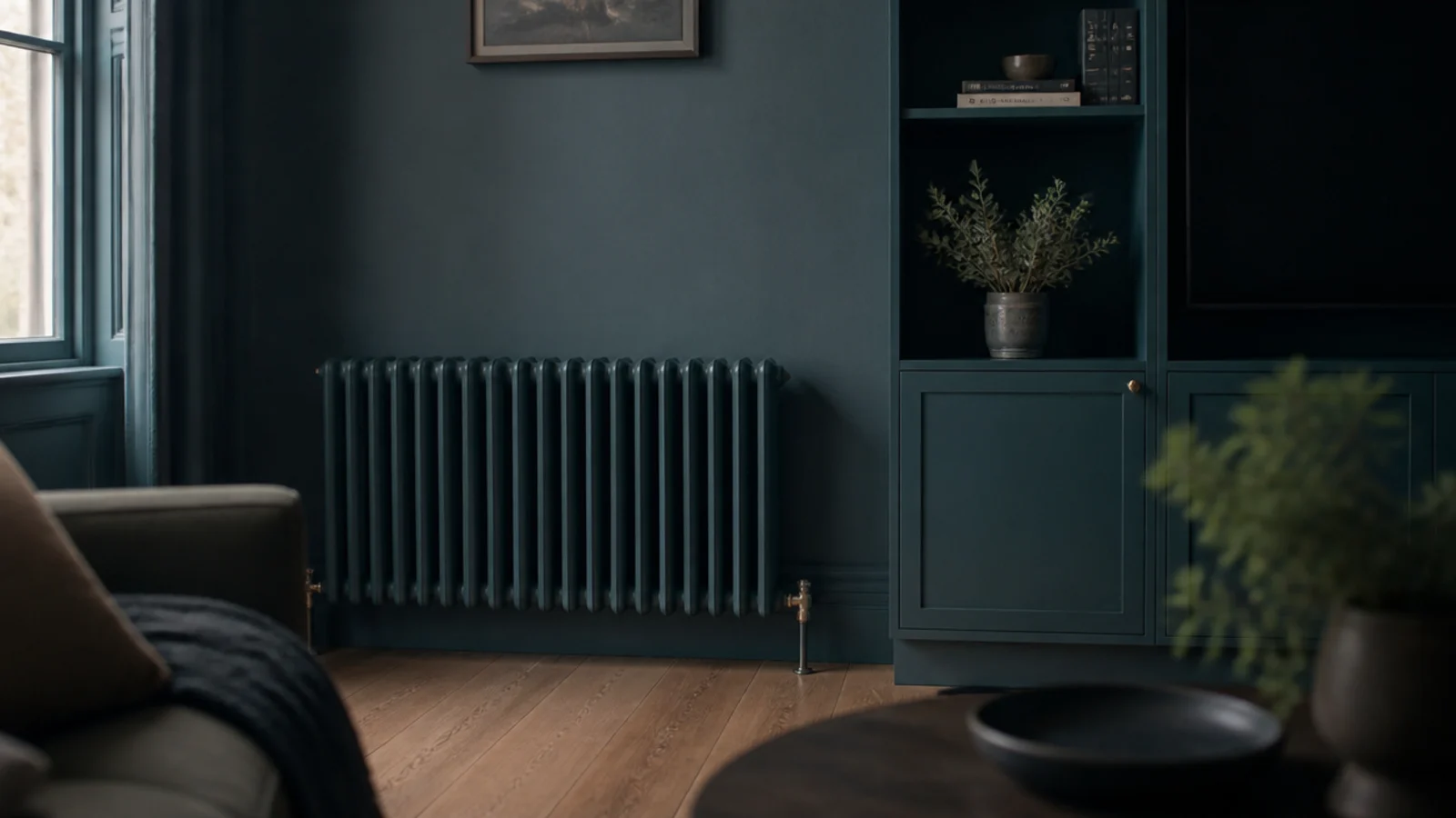 radiator painted the same deep shade as the wall behind it
