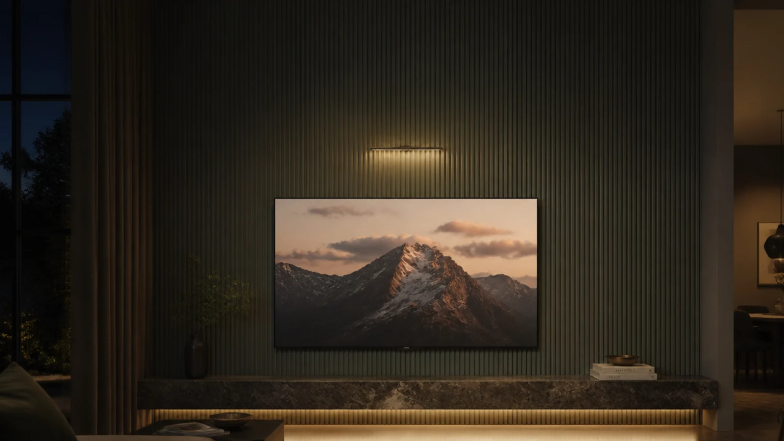 tall photo of a luxury look tv wall with fluting and warm lighting
