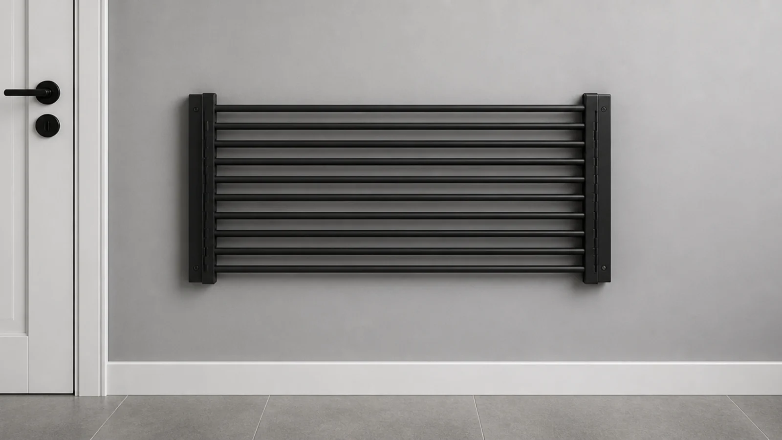 concertina wall drying rack folded flat against a painted utility wall