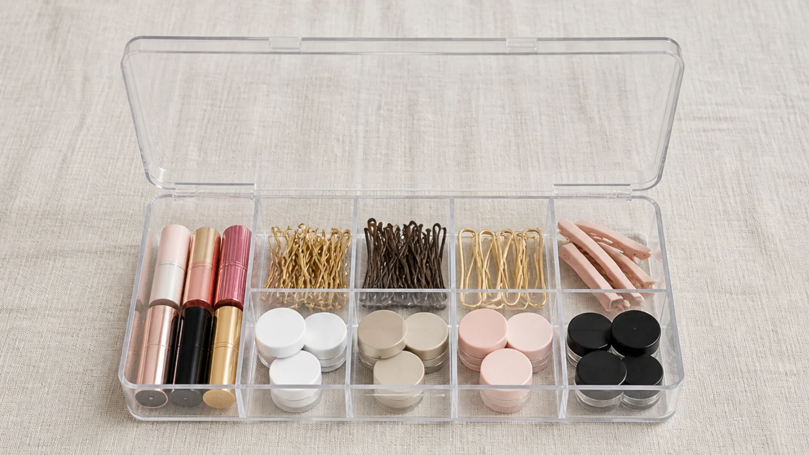 lipsticks and small pots sorted into a compartment bead box