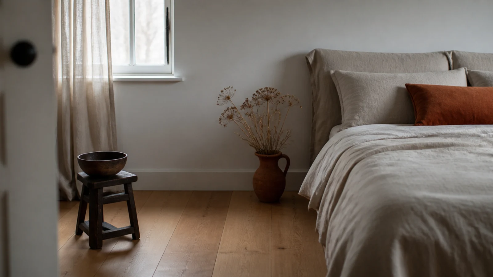 honey oak boards warming a north facing bedroom under cool daylight